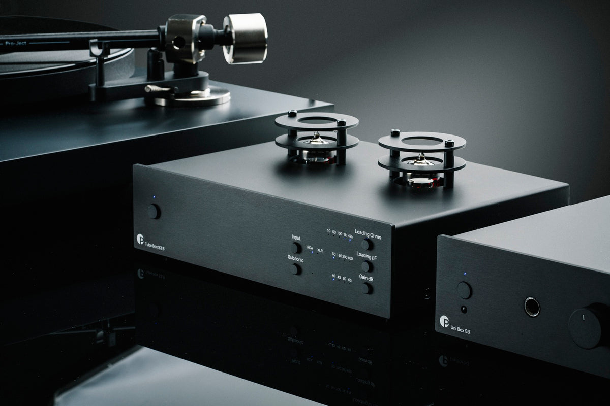 Pro-Ject Tube Box S3 B phono preamp with sleek design, featuring tubes and controls, ideal for high-quality vinyl playback.