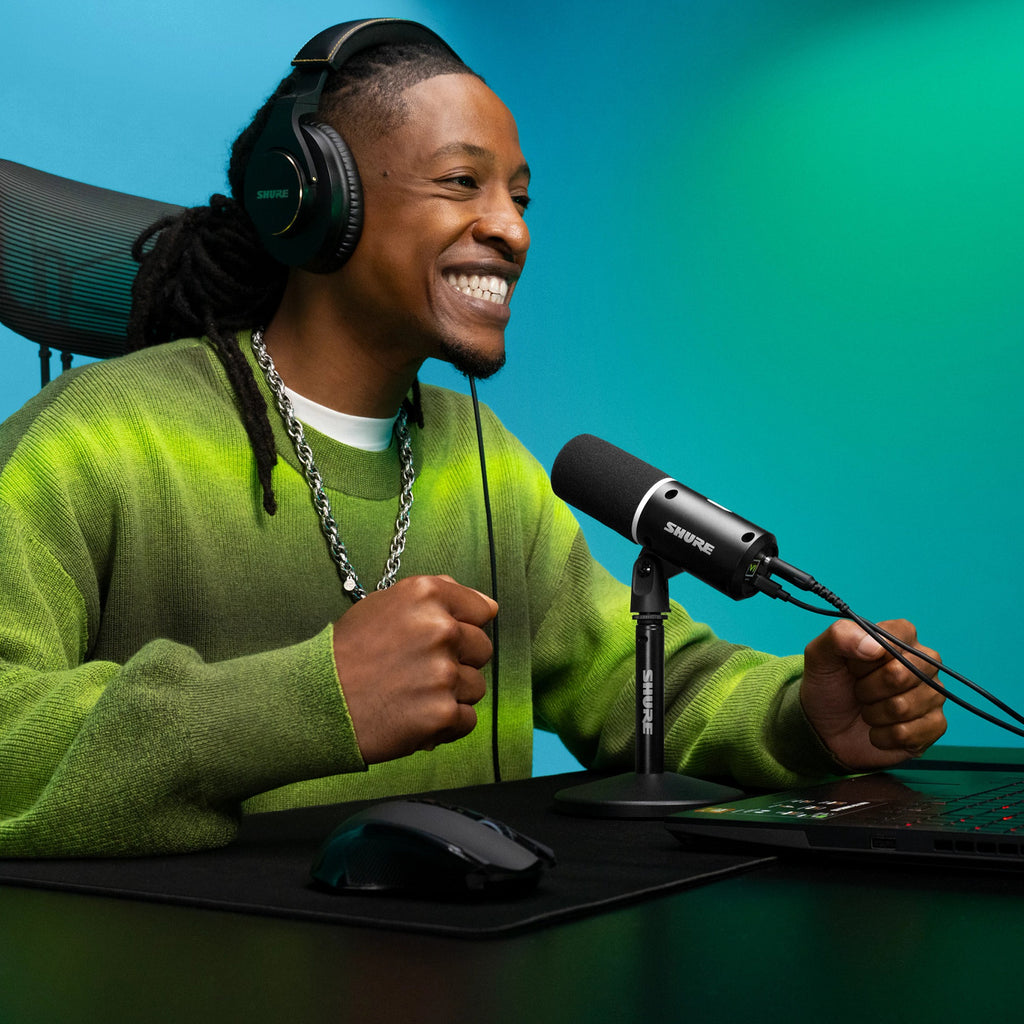 Shure MV6 Gen 2 Black, on a gaming desk with laptop